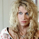 Kesha in the video for "Tik Tok," a dumb song.